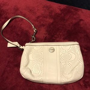 White Coach wristlet.